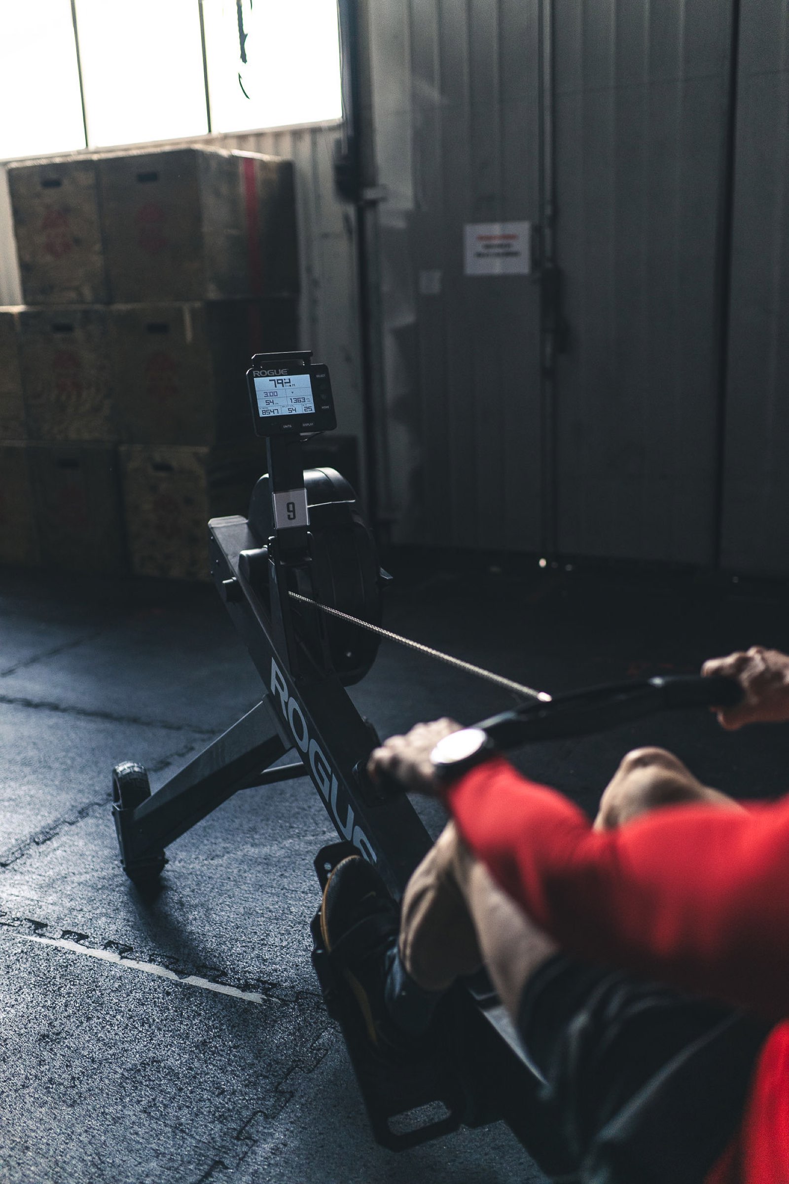Rogue erg monitor showing live meters and stroke data during a Movement Rebels rowing piece